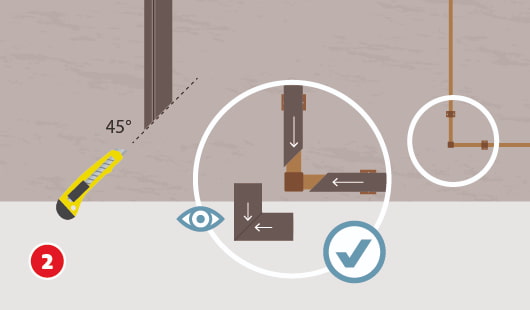 Eine schematische Darstellung zeigt das Isolieren gebogener Heizungsrohre mit zwei zugeschnittenen Rohrschalen. Mit einem Cuttermesser wird eine Isolierschale im 45°-Winkel geschnitten. Ein Vergrößerungskreis zeigt die korrekte Eckverbindung aus zwei exakt angepassten Teilen. Ein Häkchensymbol kennzeichnet die richtige Ausführung, daneben ein Augensymbol zur Detailansicht. Unten links ist ein roter Kreis mit einer weißen 2