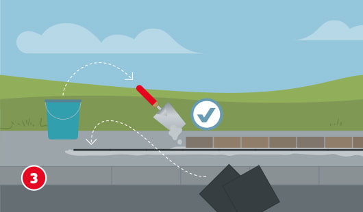 Eine schematische Darstellung zeigt das Anlegen einer Sperrschicht beim Mauern. Eine Schicht Mörtel wird auf das Fundament aufgetragen, darüber werden die ersten Steine gesetzt. Eine Kelle und ein Wassereimer stehen bereit. Ein Häkchen kennzeichnet die korrekte Ausführung. Unten links ist ein roter Kreis mit einer weißen 3
