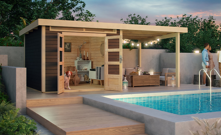 Ein Karibu Gartenhaus draußen an einem Pool